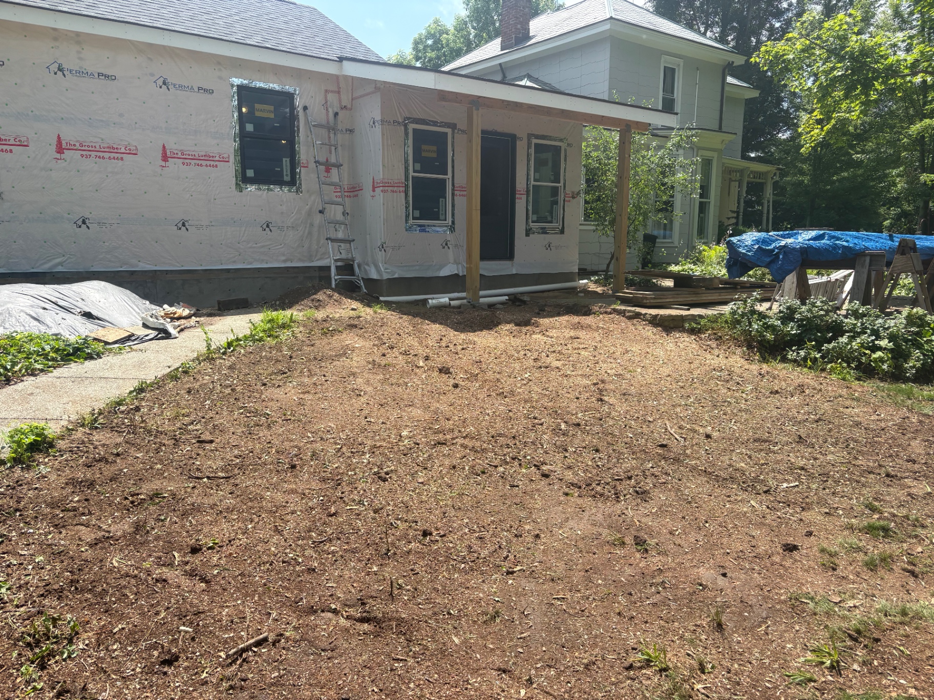 After: yard cleared and ready for landscaping
